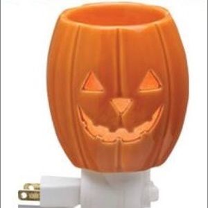 Brand New Scentsy Jack o Lantern plug in.